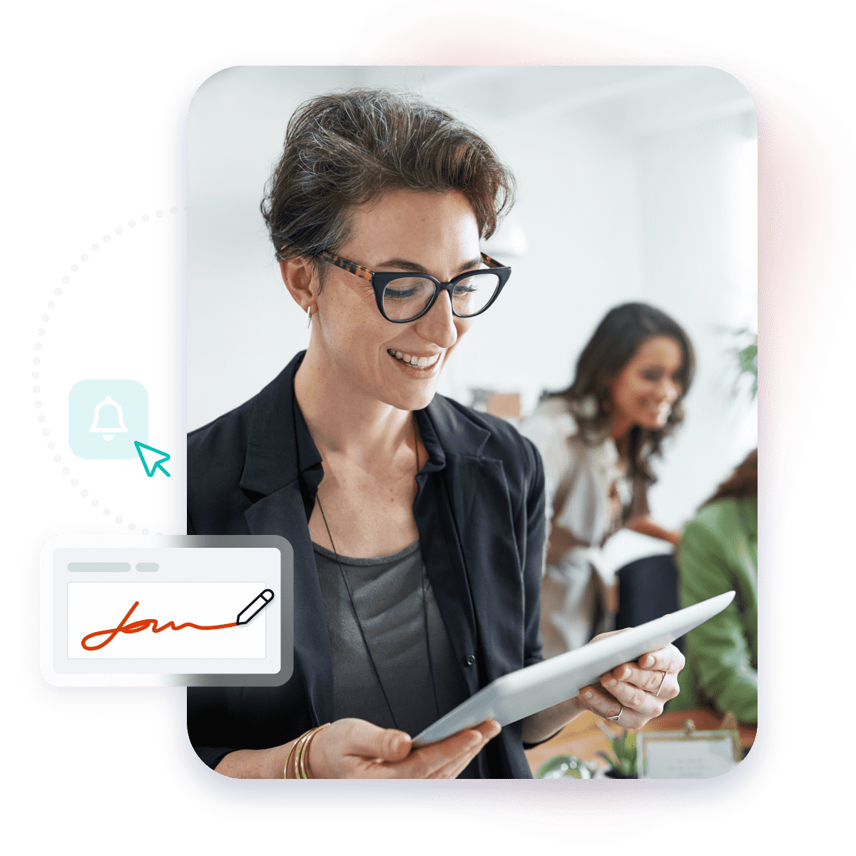 Happy woman looking at a tablet in an office